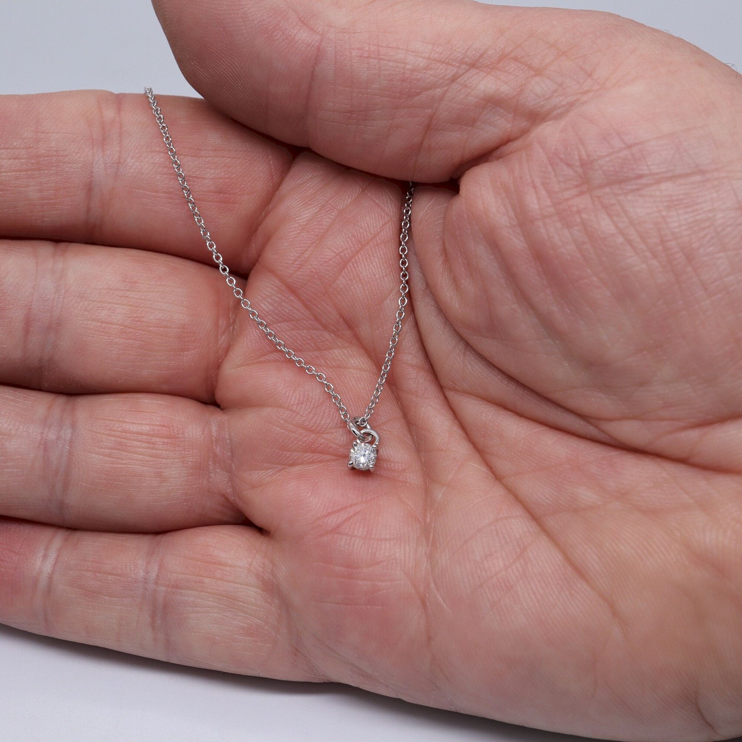 White gold Diamond pendant, classic claw set drop style