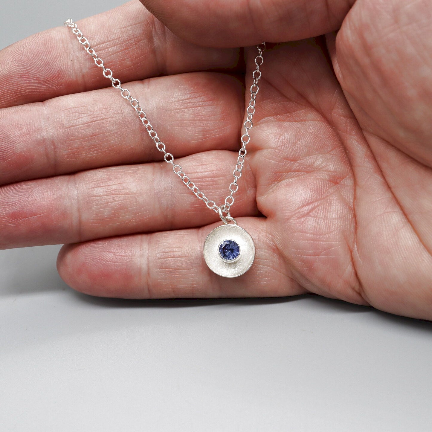 Sapphire pendant, silver Water Droplets design.