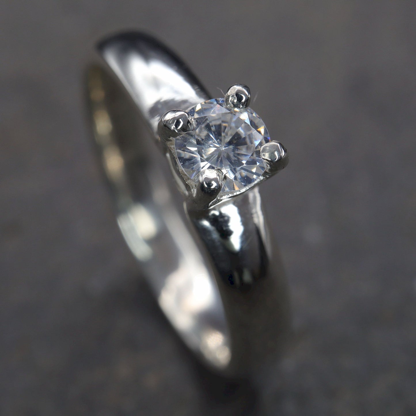 Solitaire diamond white gold Carlisle quarter carat handmade ring.