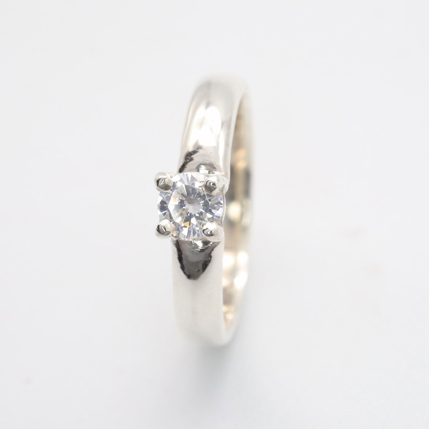 Solitaire diamond white gold Carlisle quarter carat handmade ring.