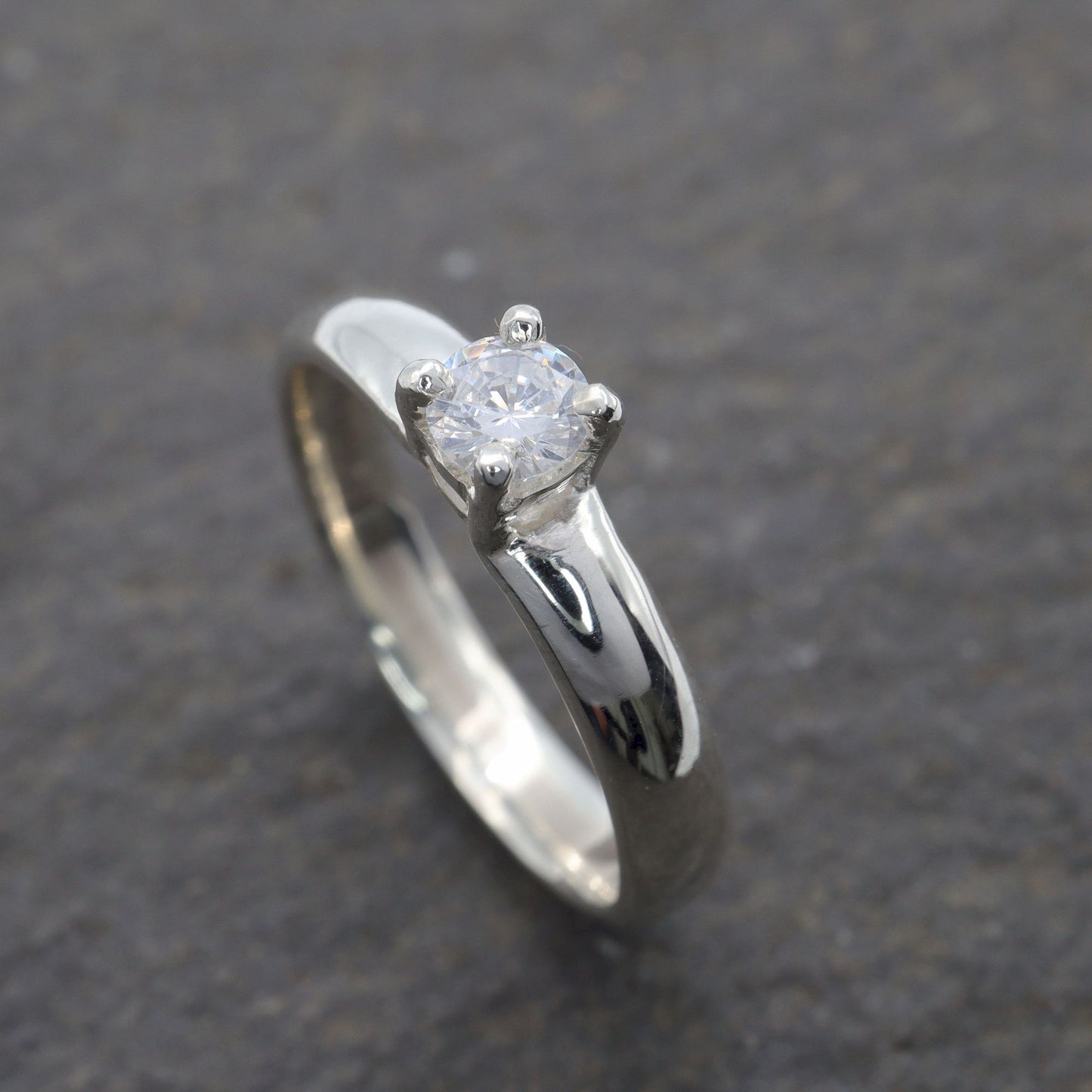 Solitaire diamond white gold Carlisle quarter carat handmade ring.