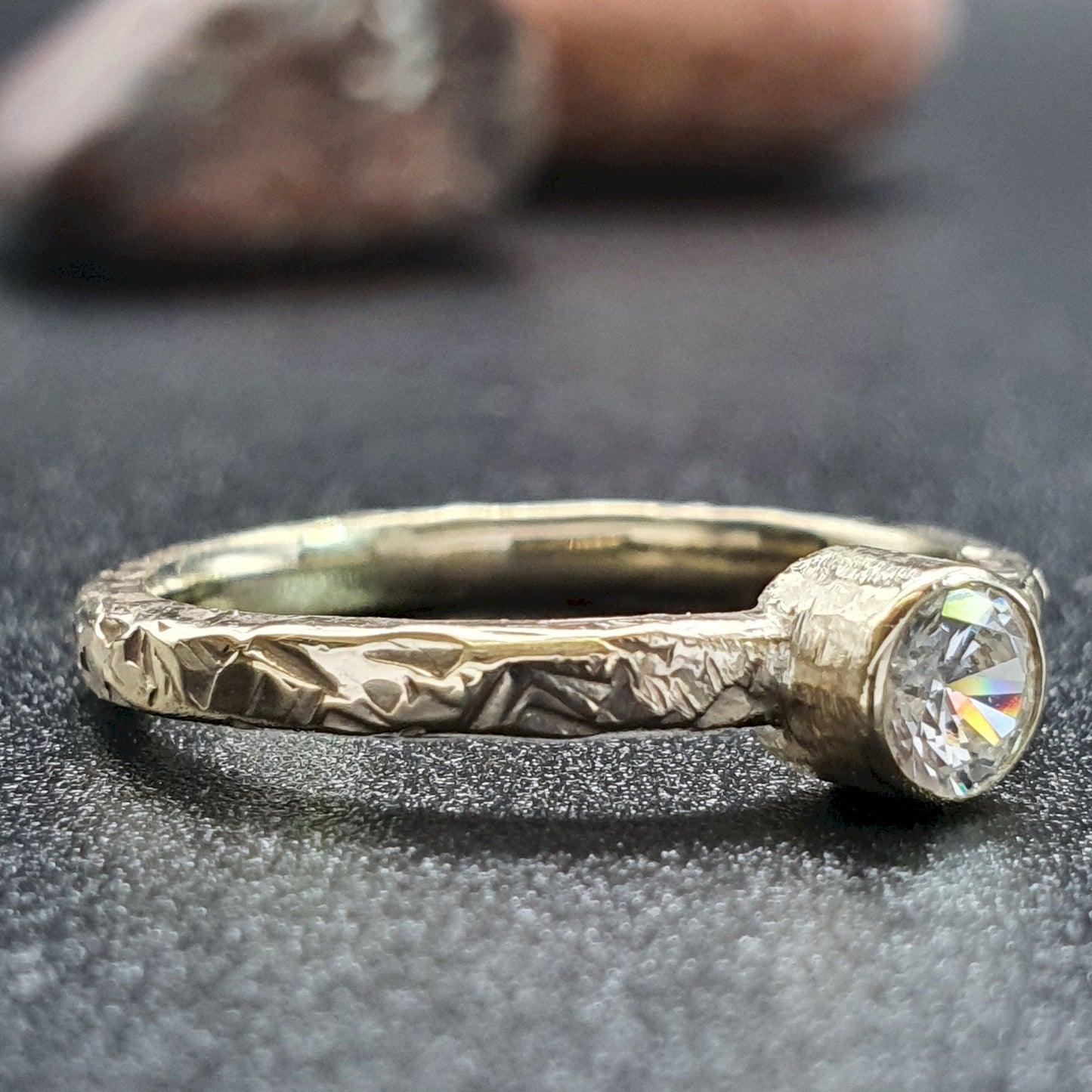 Solitaire quarter carat diamond Fire design yellow gold ring