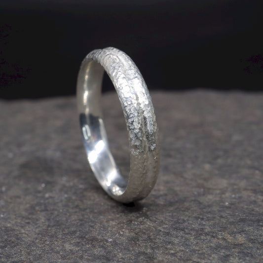 White gold narrow wedding ring with a carved rustic pattern, Fleetwith Pike design.