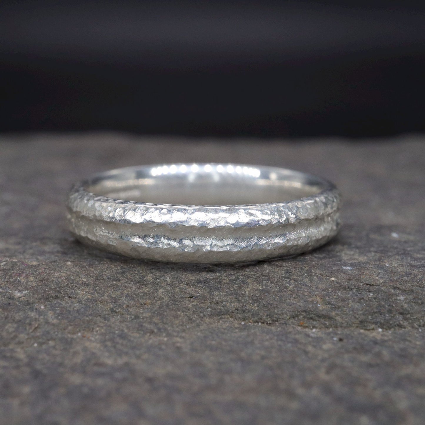 White gold narrow wedding ring with a carved rustic pattern, Fleetwith Pike design.