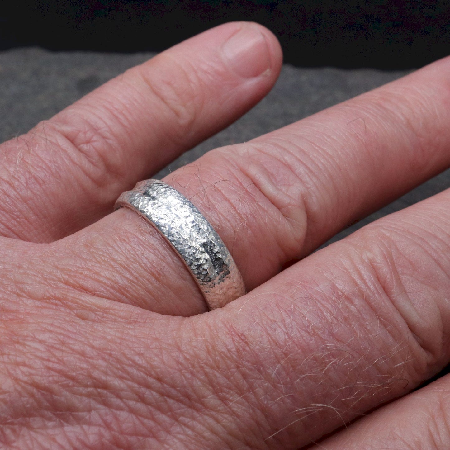 White gold wide wedding ring with a carved rustic pattern, Fleetwith Pike design.