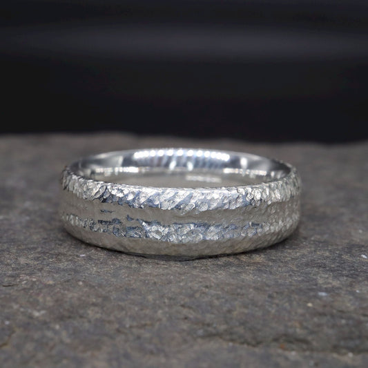 White gold wide wedding ring with a carved rustic pattern, Fleetwith Pike design.