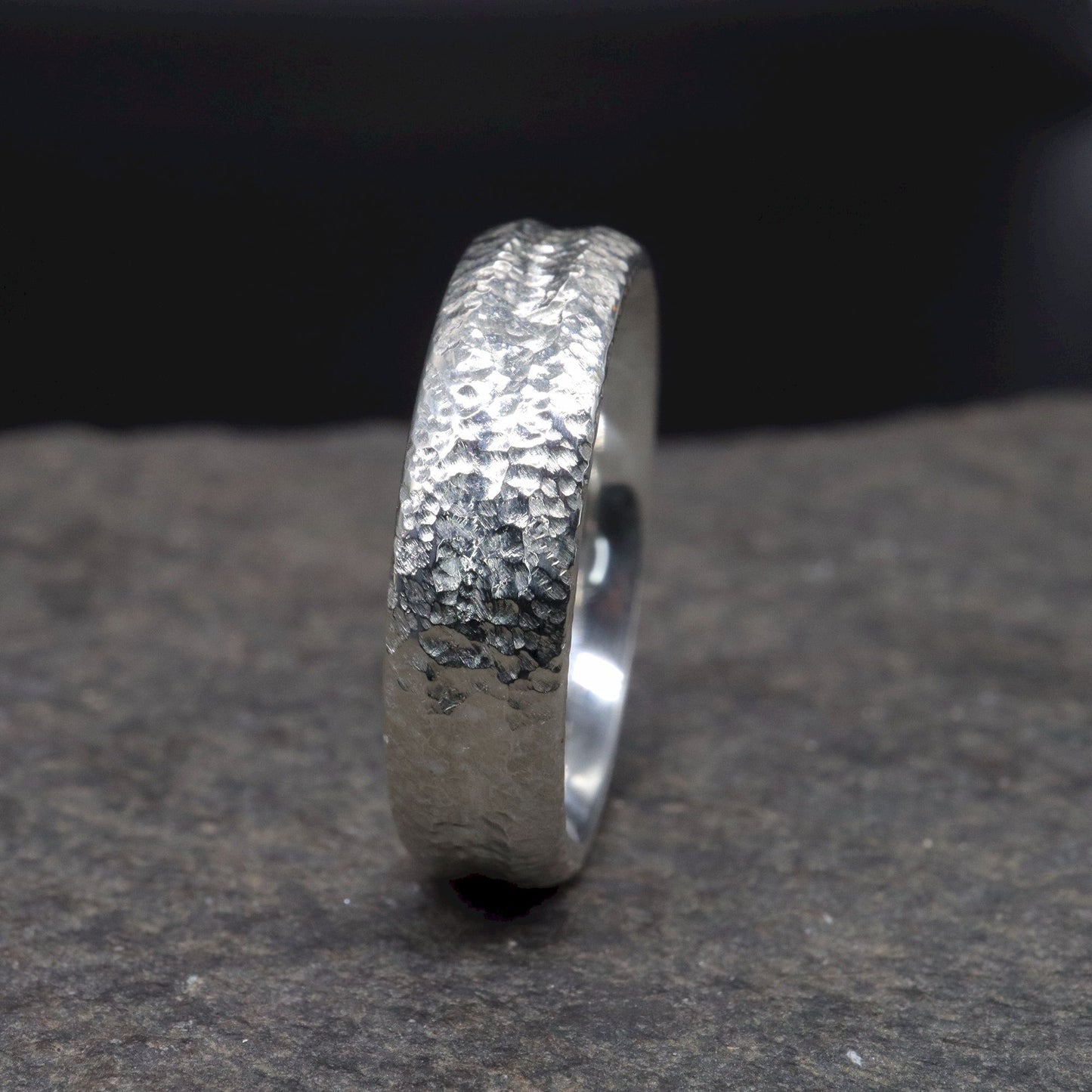 White gold wide wedding ring with a carved rustic pattern, Fleetwith Pike design.