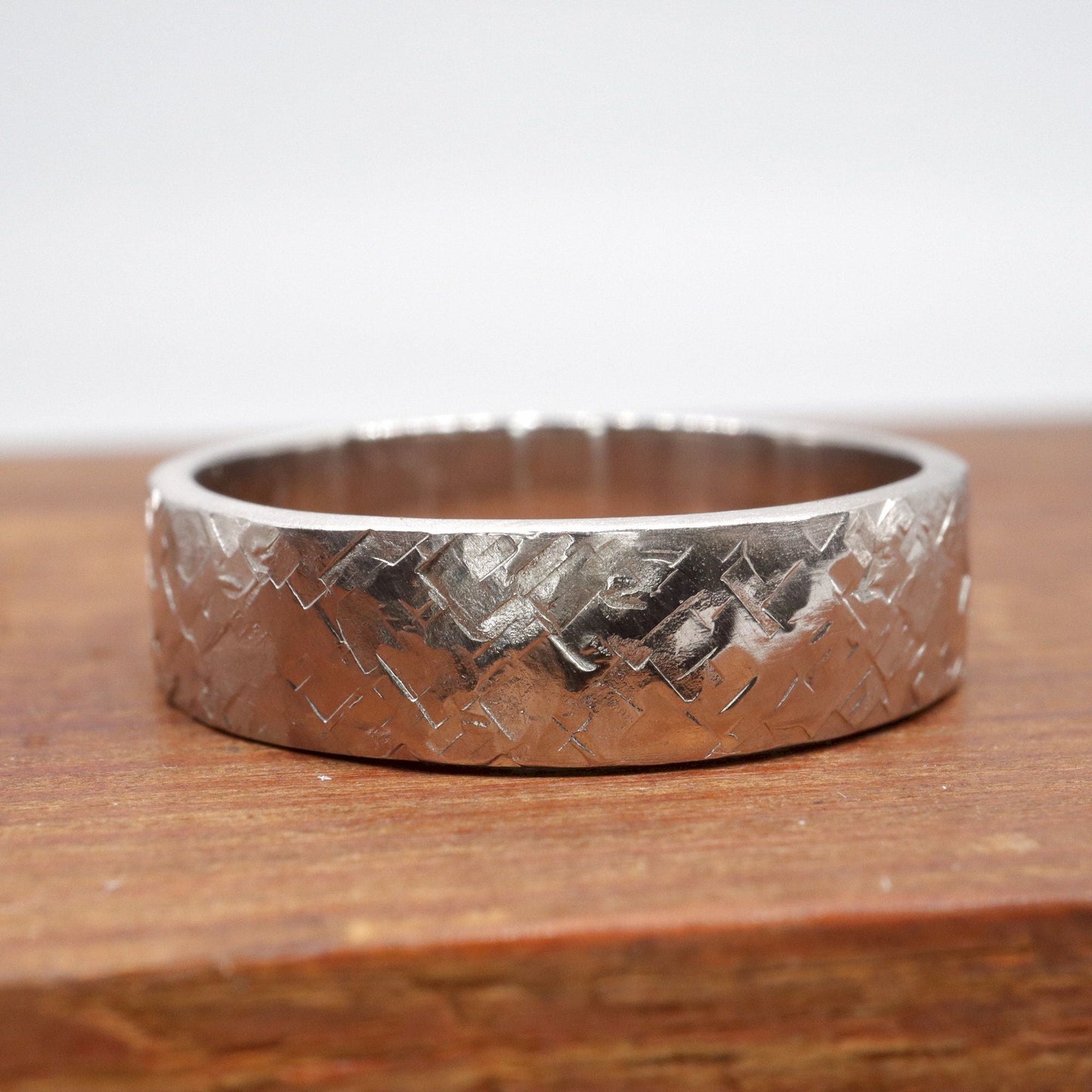 Broad silver wedding ring, Kendal flat rustic hammered design