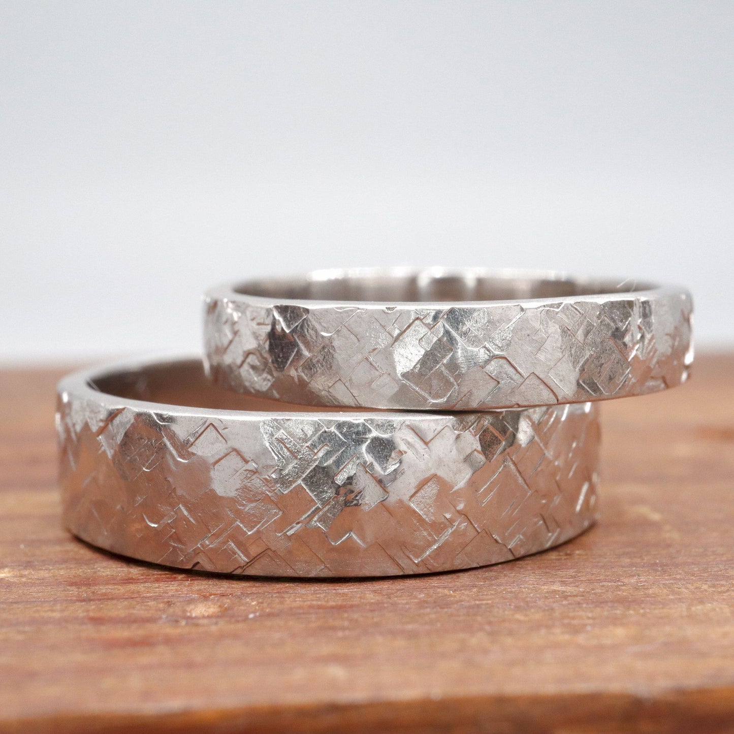 White gold matching Kendal design rustic hammered wedding ring set - flat textured 4mm and 6mm men and womens rings.