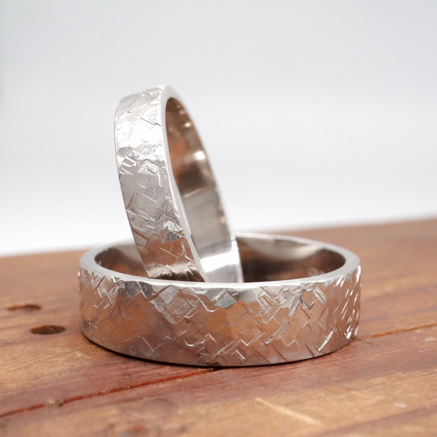 White gold matching Kendal design rustic hammered wedding ring set - flat textured 4mm and 6mm men and womens rings.