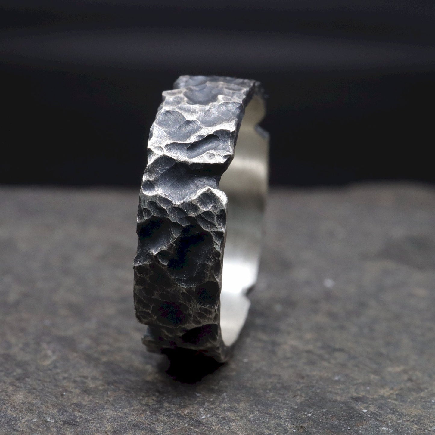 Lakeland Rock mens wedding, promise or engagement ring with a hand carved design.