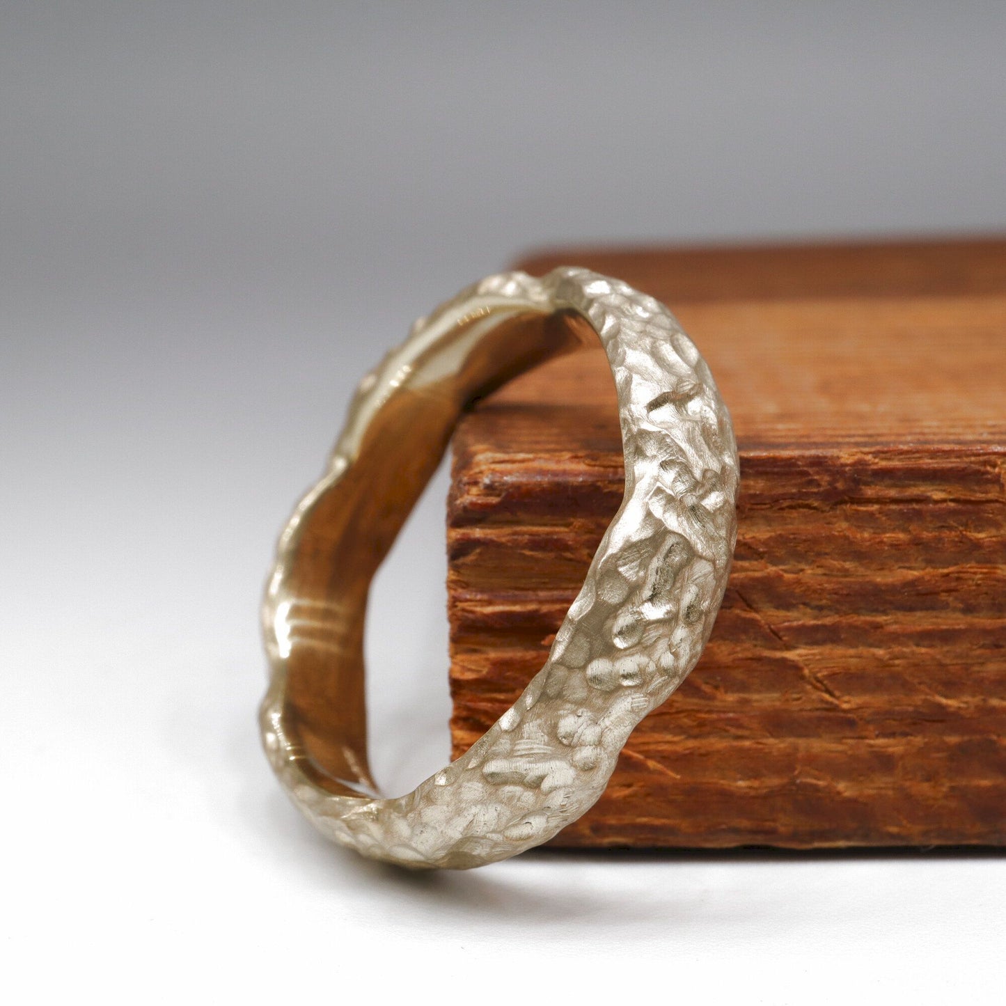 Yellow gold broad wedding ring - Lakeside design.