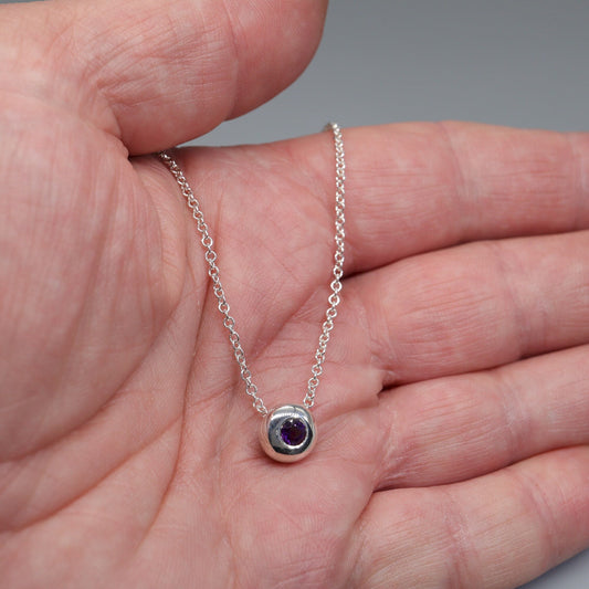 Amethyst runner pendant, silver slider button design, February Birthstone