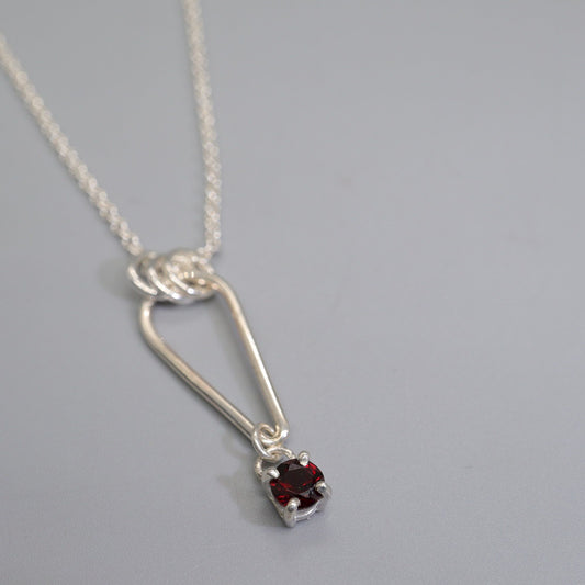 Small Water Tarn Garnet pendant.