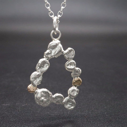 Silver and gold oval pendant - Stepping Stones handmade original jewellery design. Ref JF05