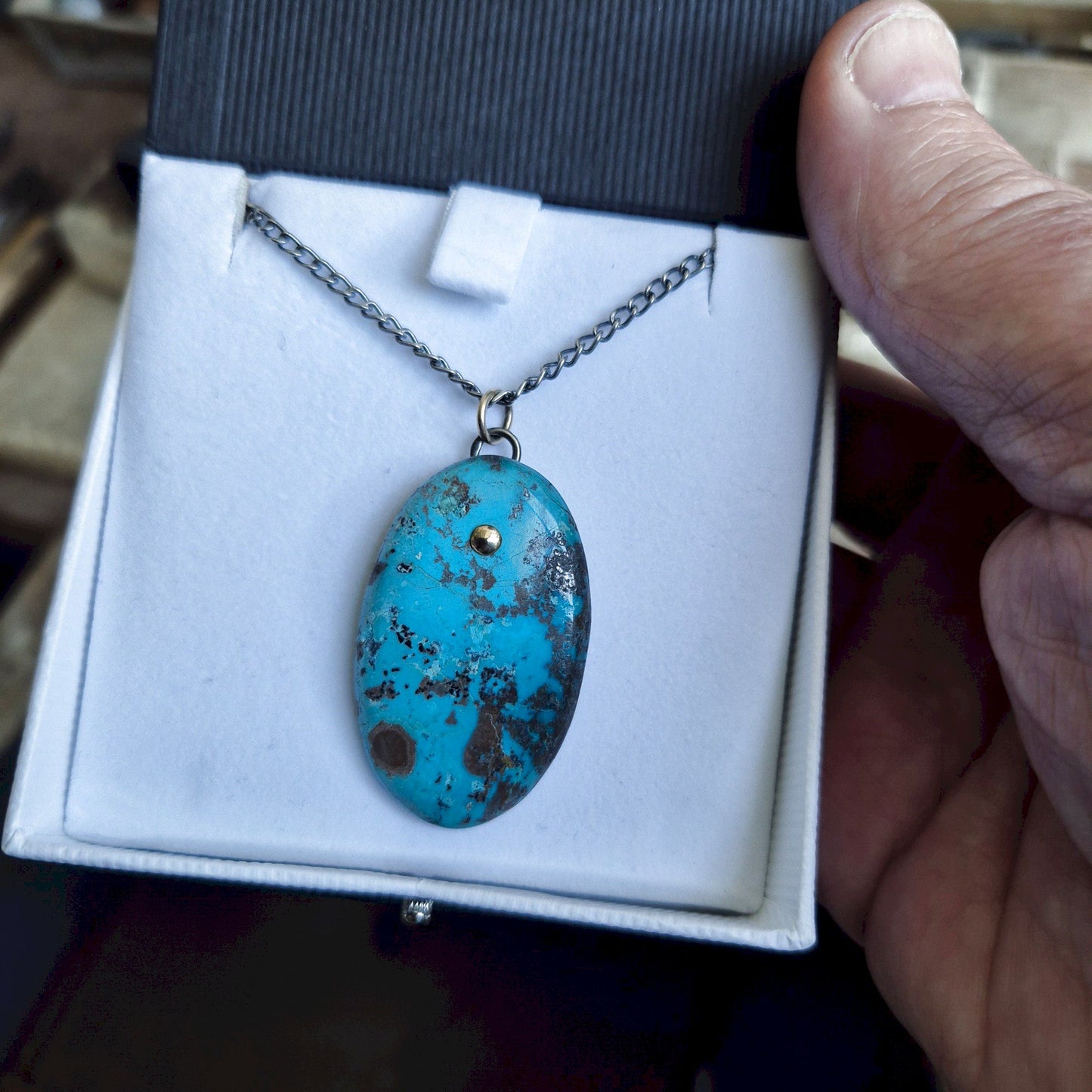 Blue Chrysocolla oval drop gold and silver pendant