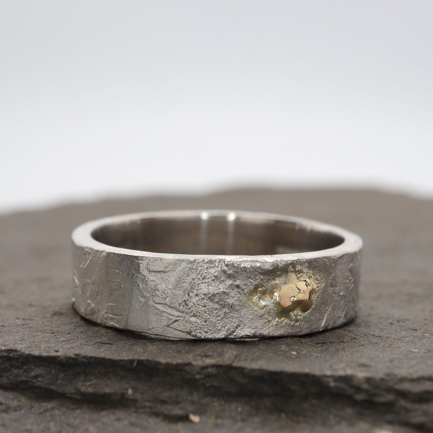 Silver and gold ring - hammered textured band - Windermere Sunspot design.