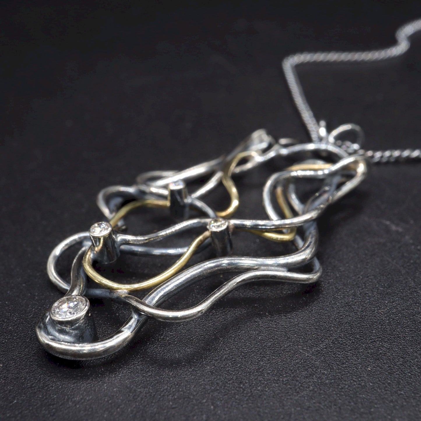 Diamond set 18ct gold and antique dark stained silver handmade necklace