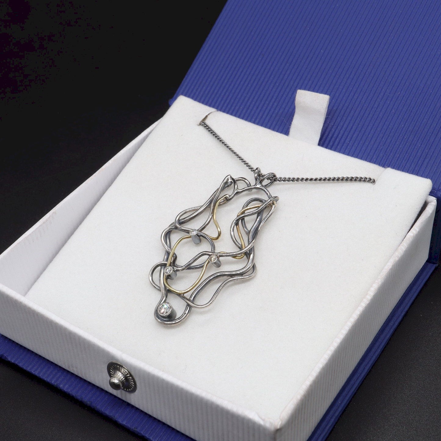 Diamond set 18ct gold and antique dark stained silver handmade necklace