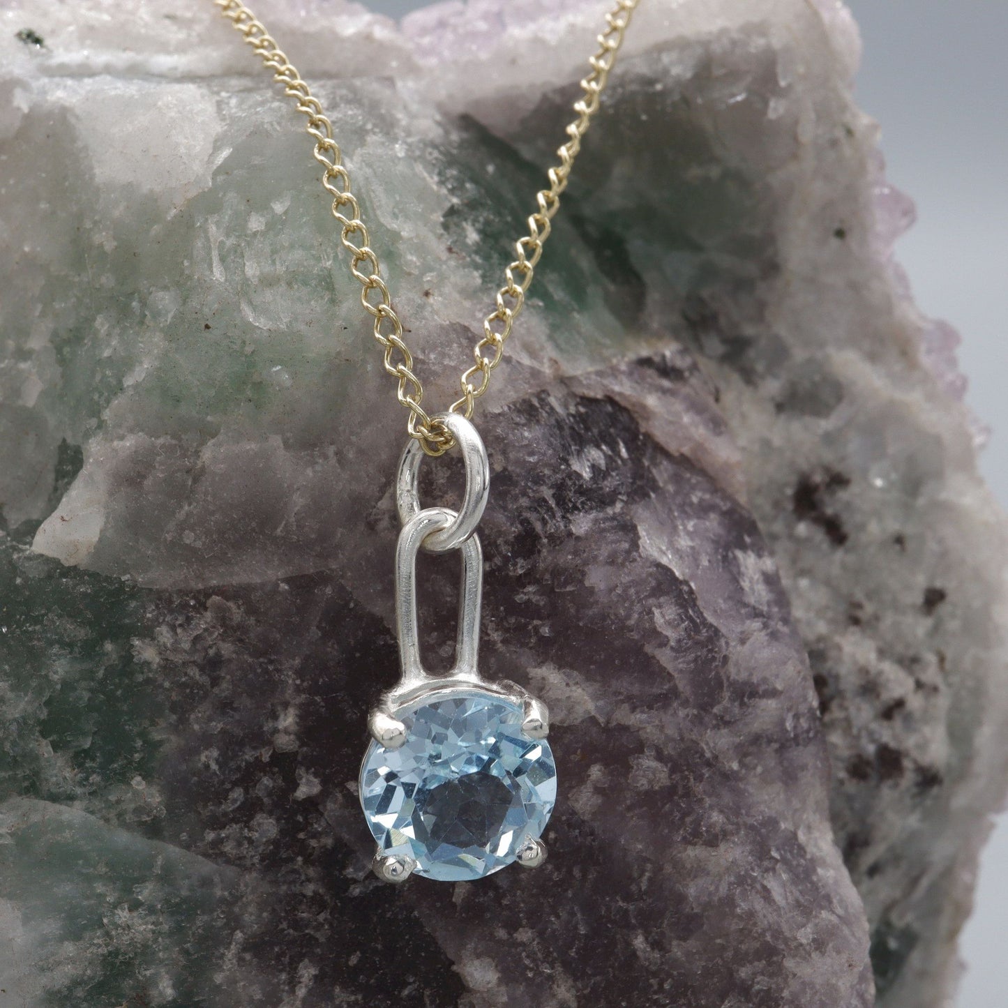 Sky blue Topaz silver and gold handmade drop pendant