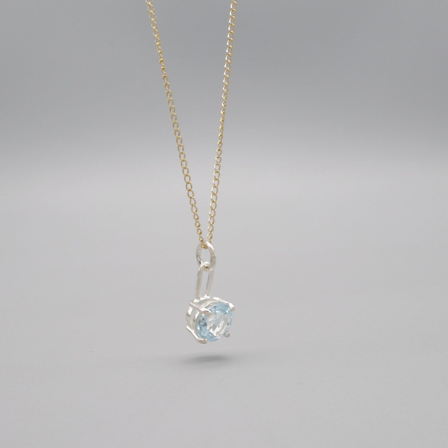 Sky blue Topaz silver and gold handmade drop pendant