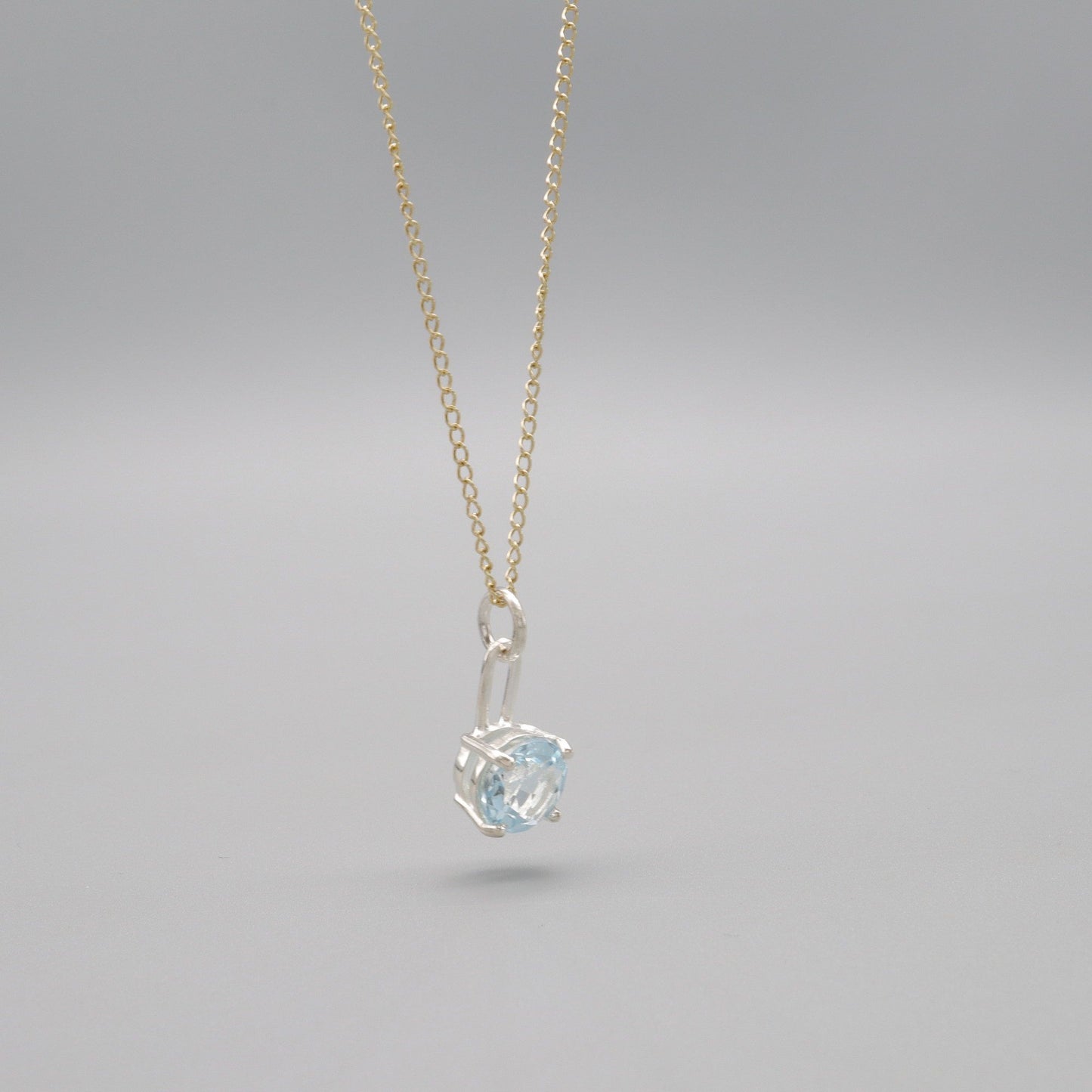 Sky blue Topaz silver and gold handmade drop pendant