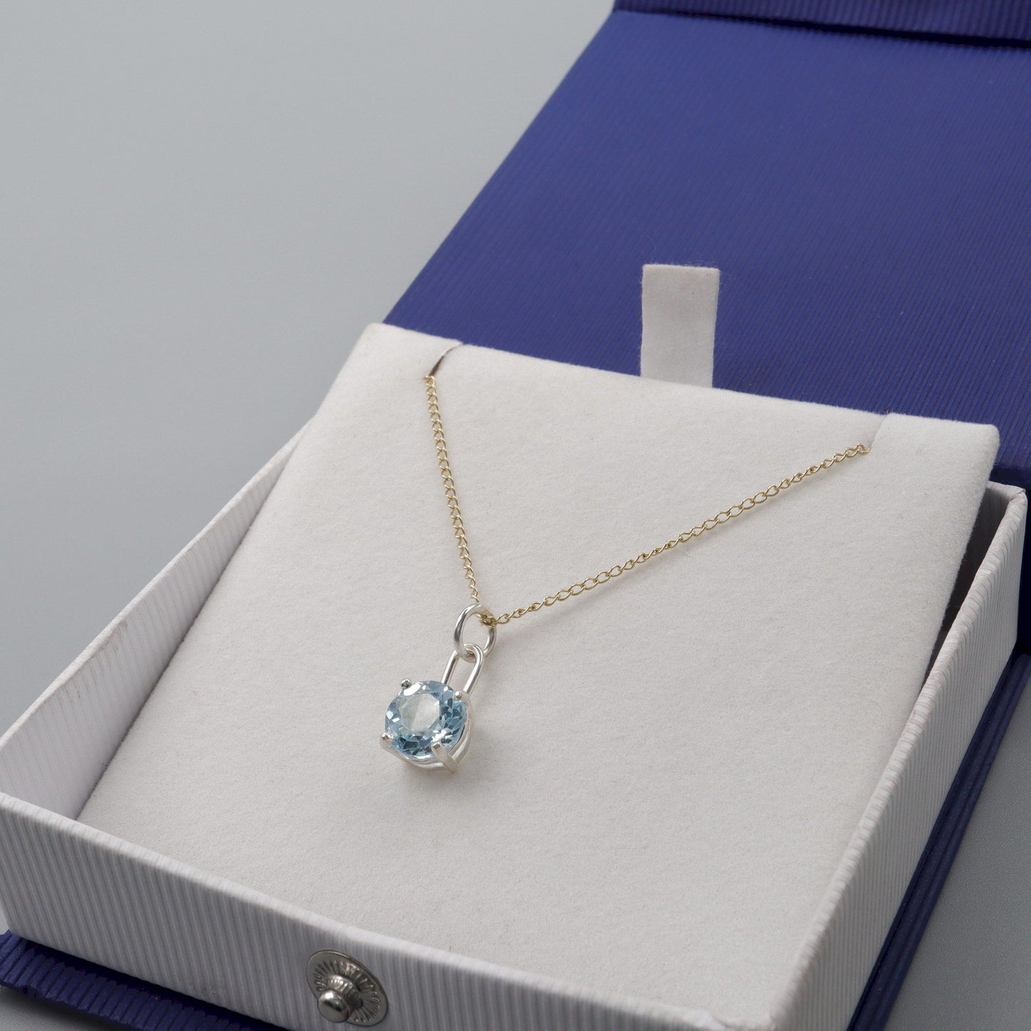 Sky blue Topaz silver and gold handmade drop pendant