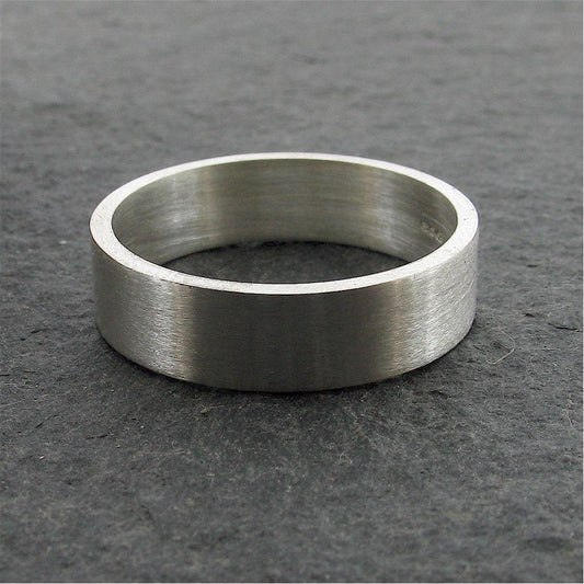 White gold flat broad wedding ring. Classic Wedding Rings Richard Harris Jewellery