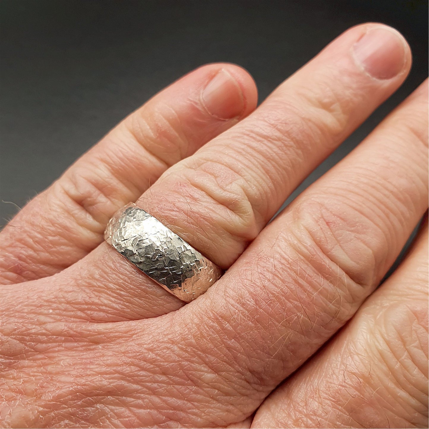 Wedding ring, broad silver Fire hammered design - Cumbrian Designs