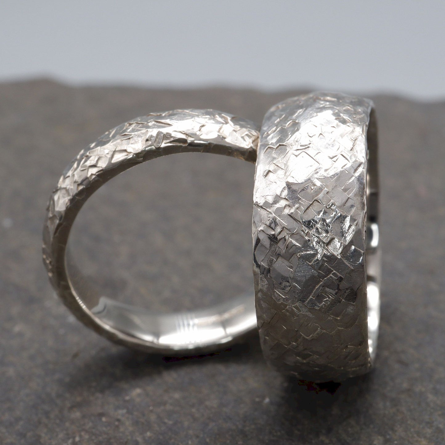 Fire Hammered matching silver ring set, 5mm and 8mm designs.