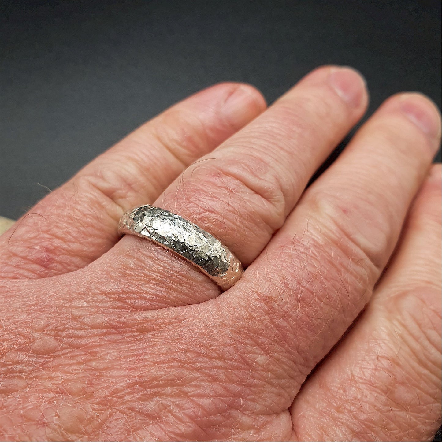 Wedding ring, broad white gold Fire hammered design - Cumbrian Designs