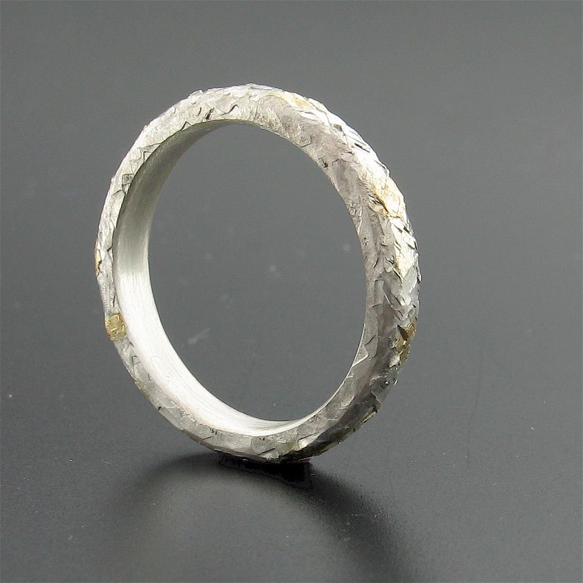 Silver and gold hammered thin wedding ring, Morning View design. Designer Wedding Rings CumbrianDesigns
