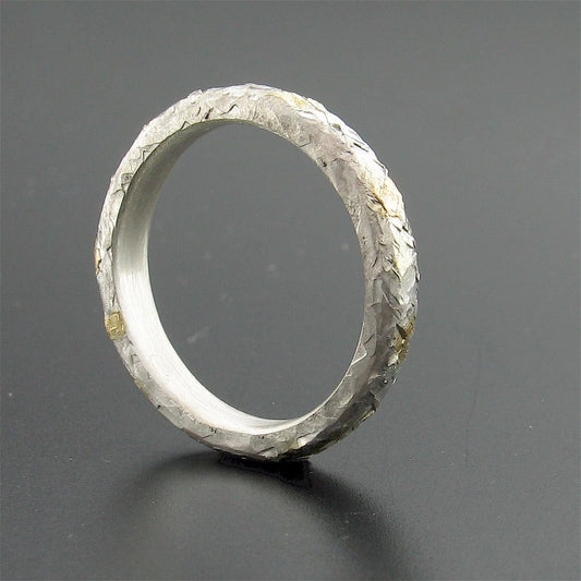 Silver and gold hammered thin wedding ring, Morning View design. Designer Wedding Rings CumbrianDesigns