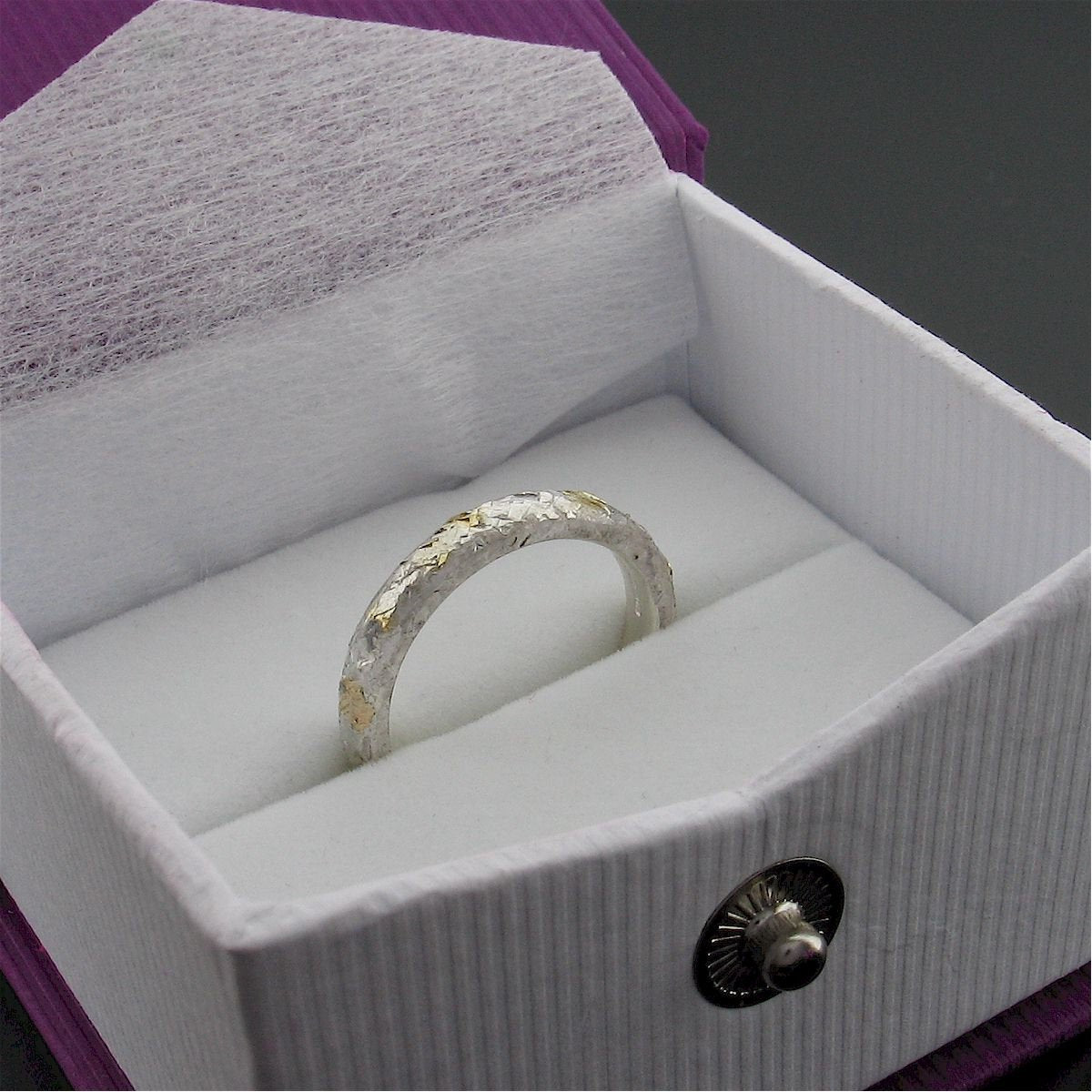 Silver and gold hammered thin wedding ring, Morning View design. Designer Wedding Rings CumbrianDesigns