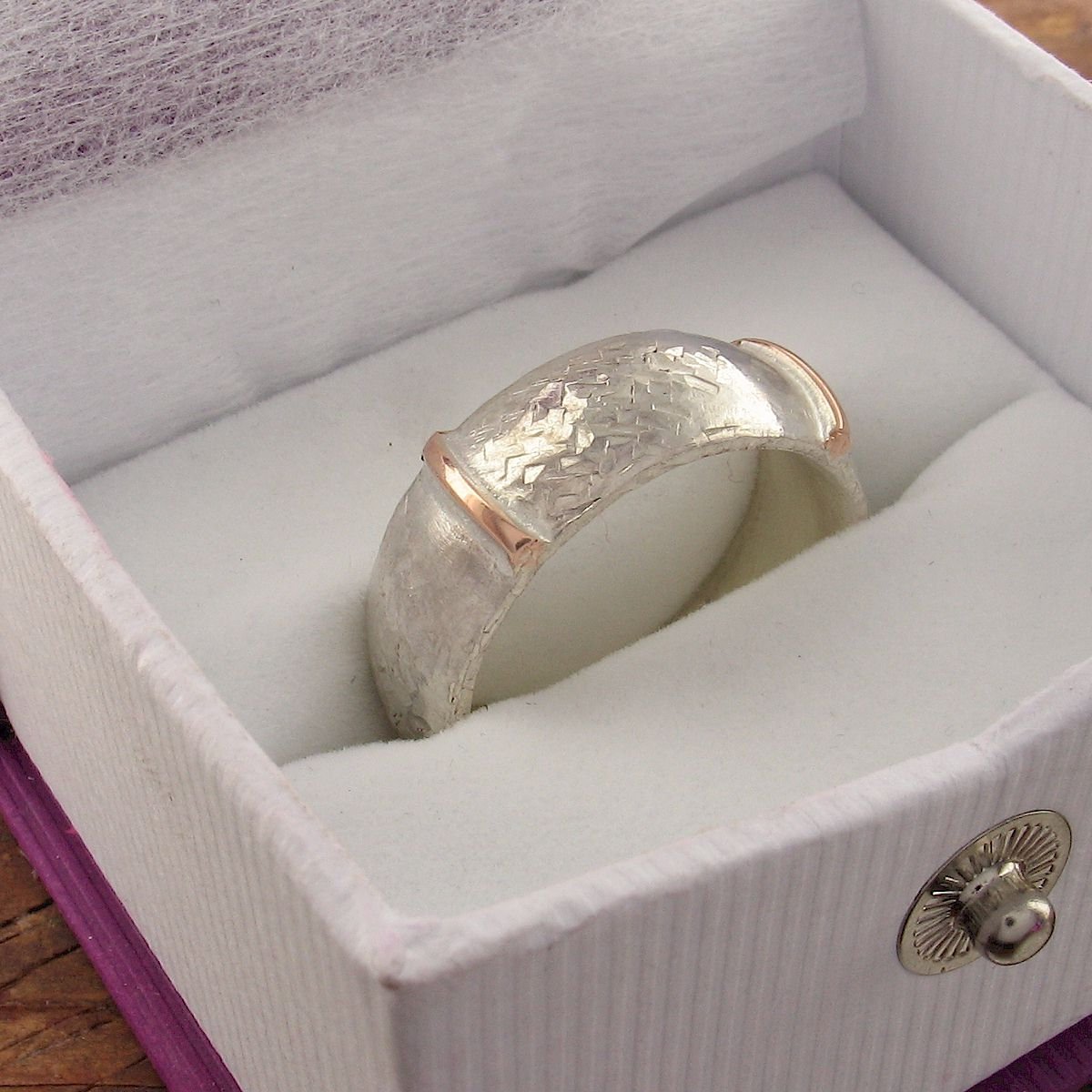 Rustic 8mm wedding ring in rose gold and silver, Lakeland Mine White design. Designer Wedding Rings Wedding Ring