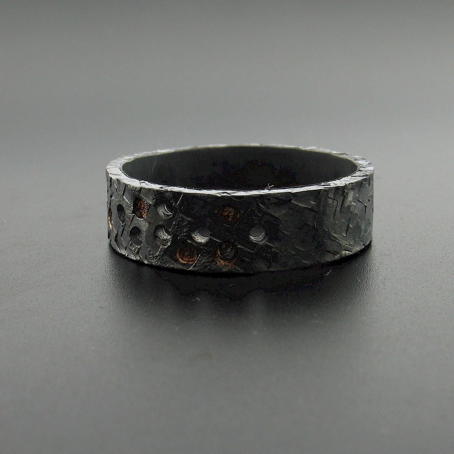 Black hammered wide wedding ring Night Stars design. Mens Designer Rings Wedding Ring