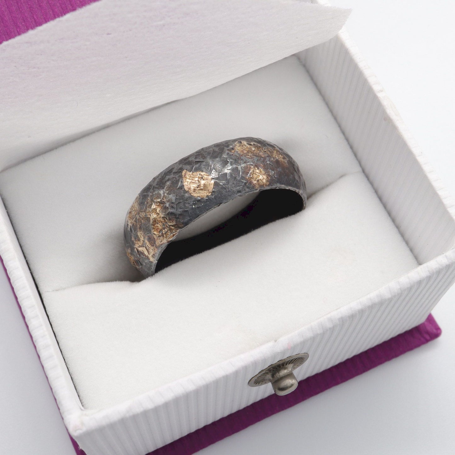 Wedding ring, black silver and gold hammered Night Sky design.