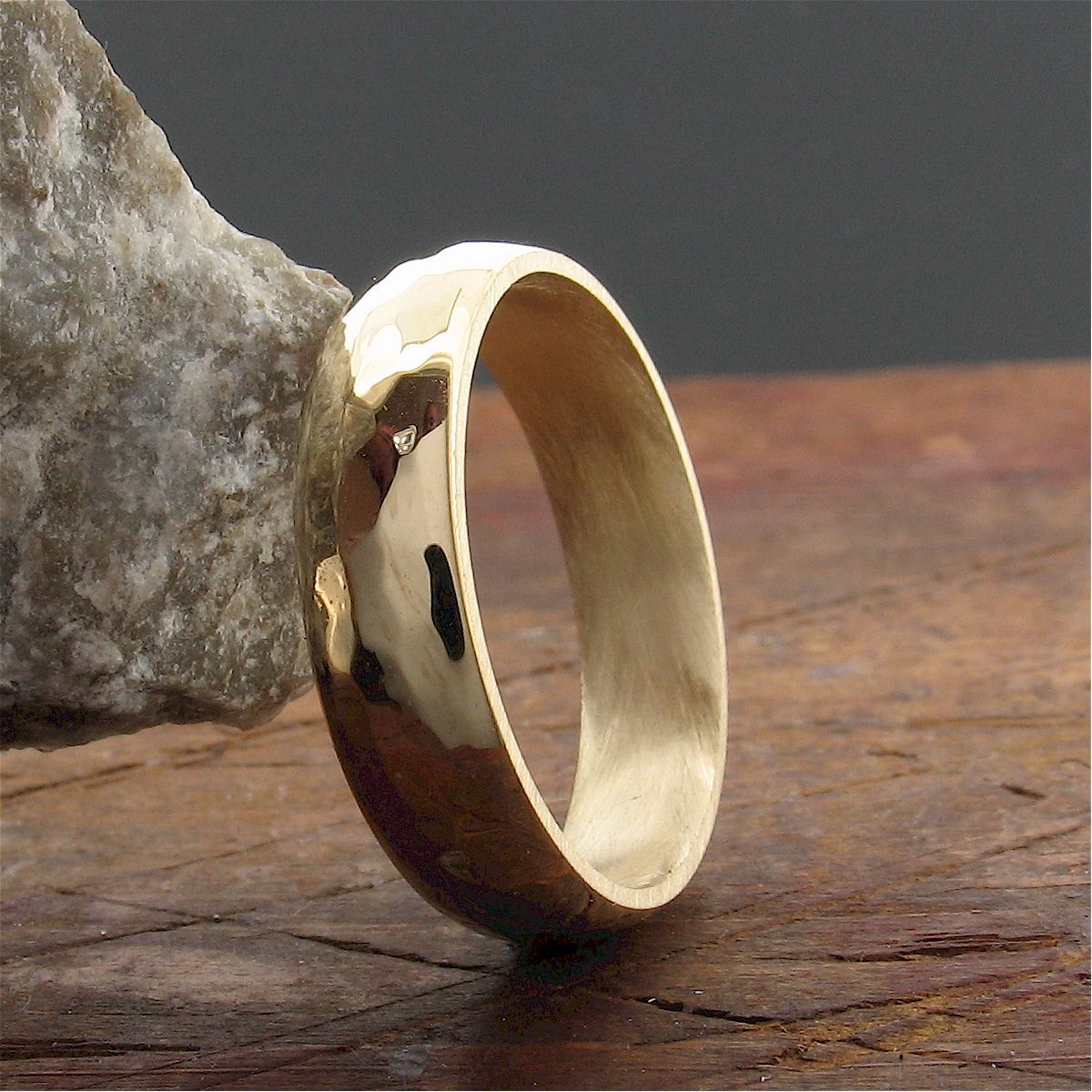Gold broad wedding ring, Pebble design Designer Wedding Rings CumbrianDesigns