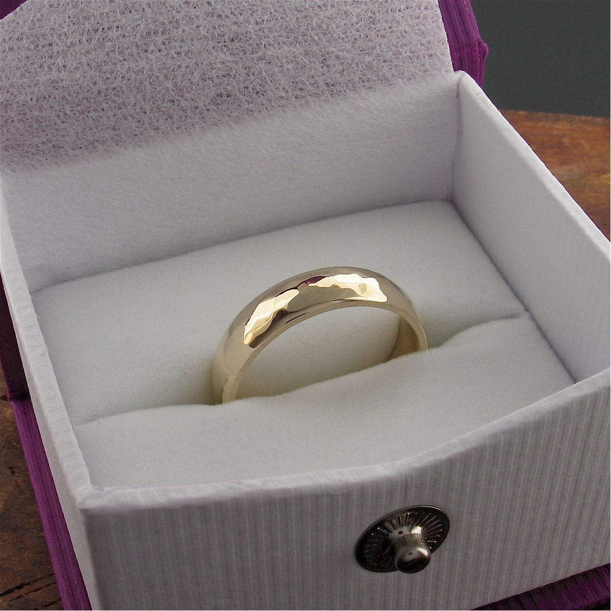 Gold broad wedding ring, Pebble design Designer Wedding Rings CumbrianDesigns