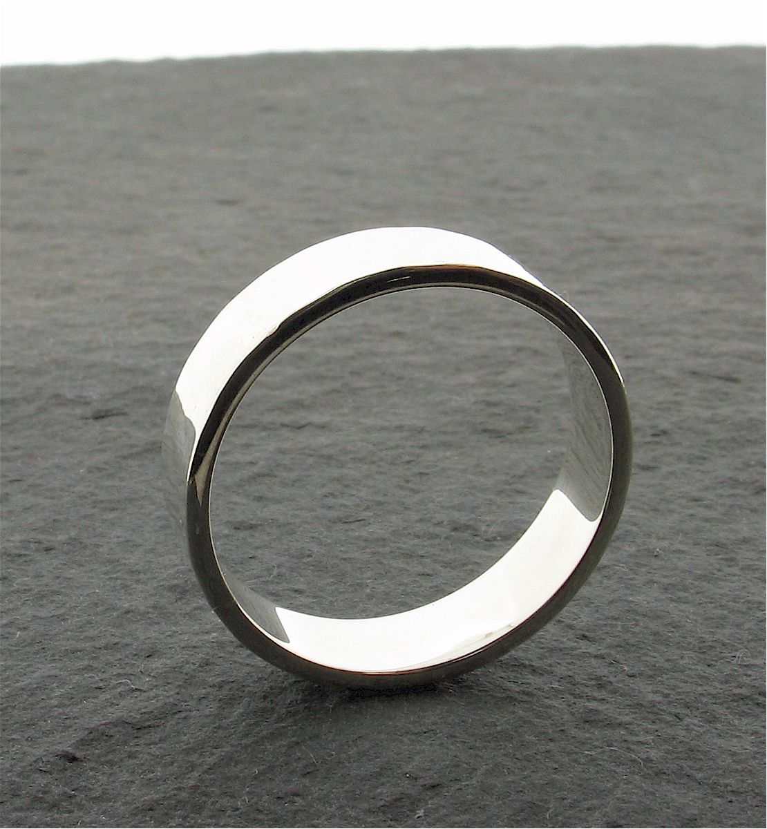 White gold broad wedding ring, Water Ripples design Designer Wedding Rings CumbrianDesigns