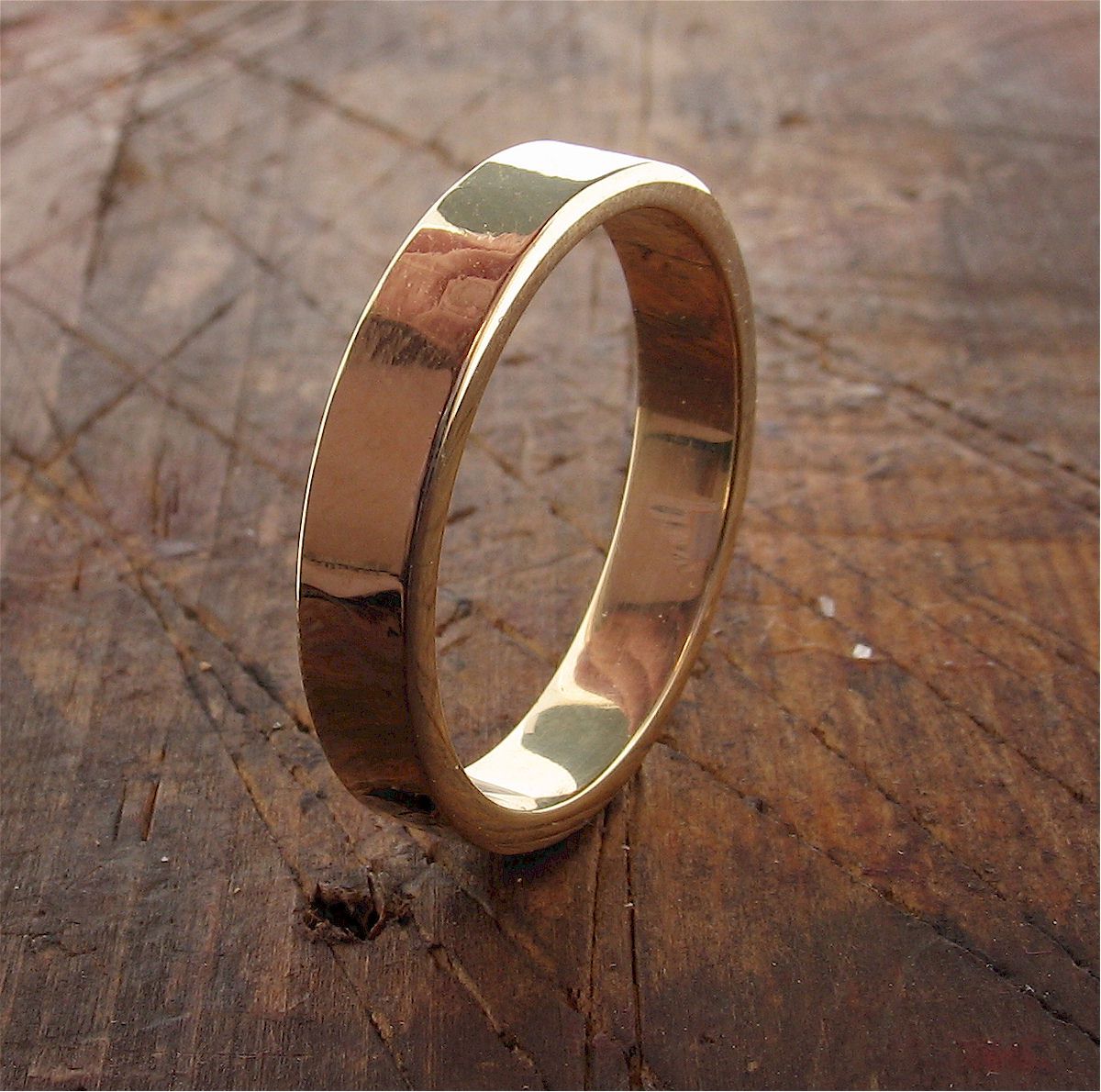 Gold broad wedding ring, Water Ripples design Designer Wedding Rings CumbrianDesigns