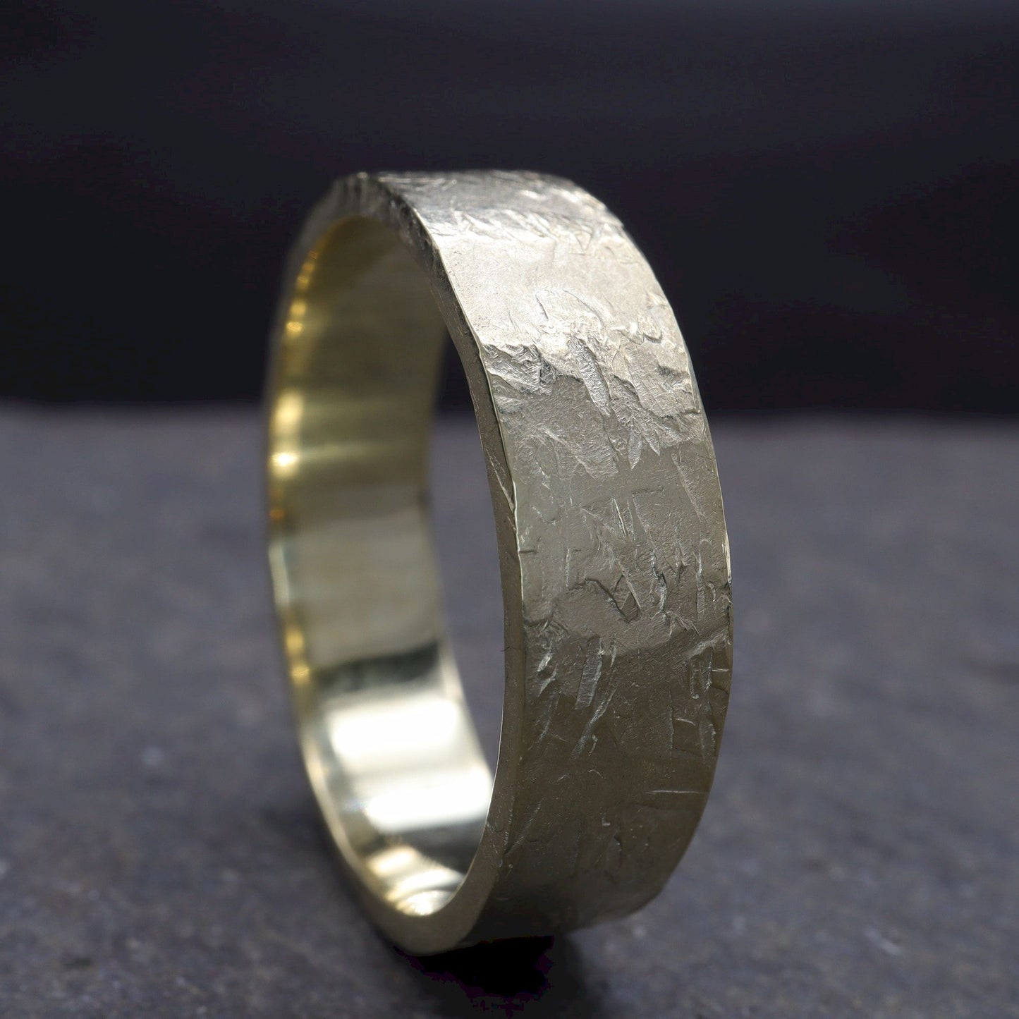 Yellow gold broad wedding ring - rustic flat hammered textured band - Windermere design.