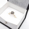 Black uncut raw diamond solitaire rustic yellow gold one carat ring.