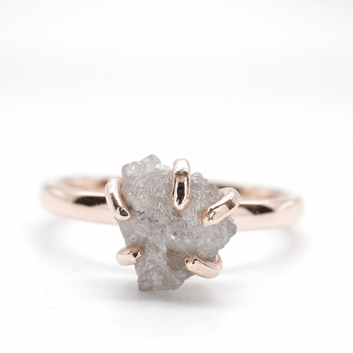 White uncut raw diamond solitaire rustic rose gold one carat ring.