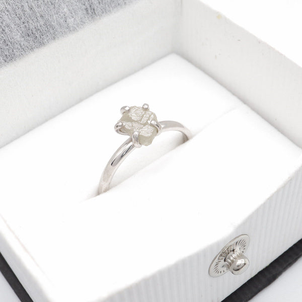 White uncut raw diamond solitaire rustic white gold ring.