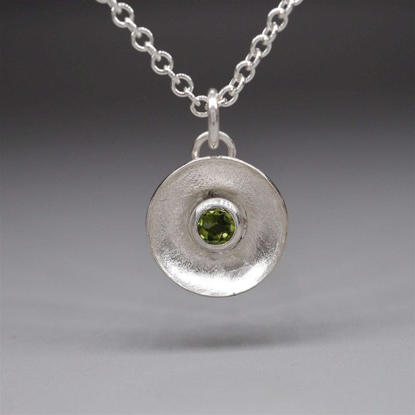 Peridot pendant, silver Water Droplets design.