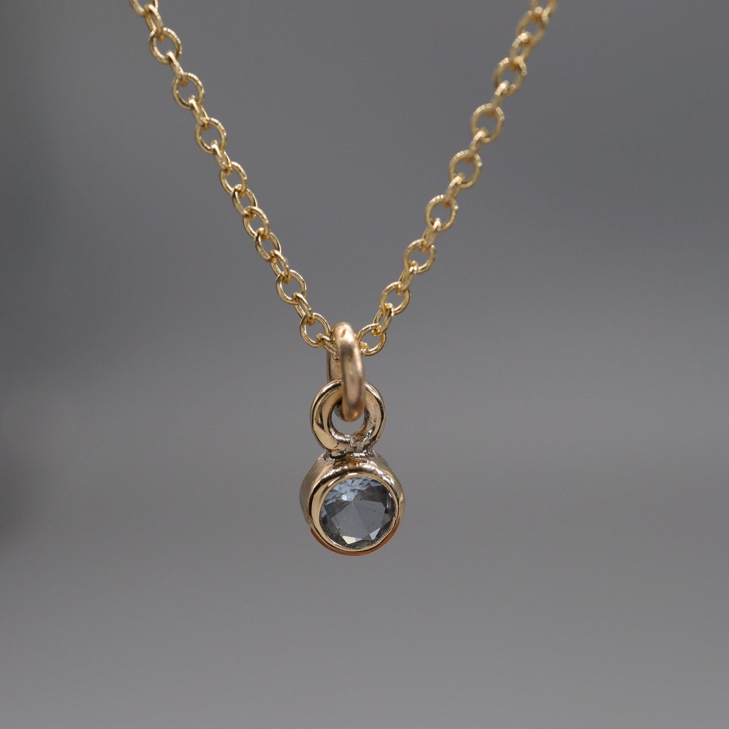 Aquamarine gold pendant with chain. March Birthstone