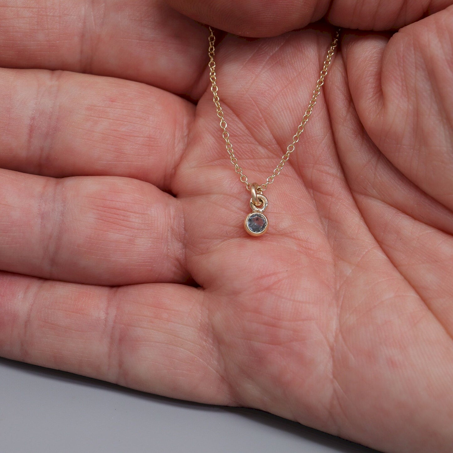 Aquamarine gold pendant with chain. March Birthstone