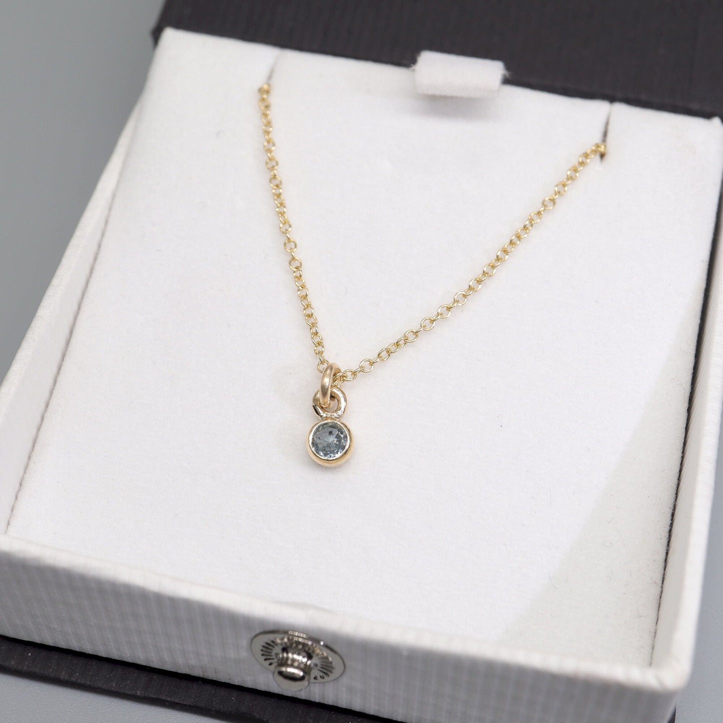 Aquamarine gold pendant with chain. March Birthstone