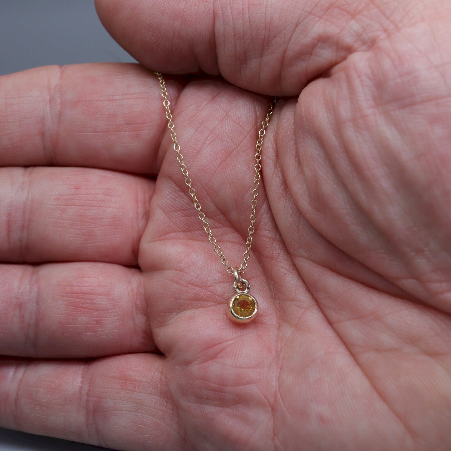 Yellow gold Citrine pendant with chain. November Birthstone